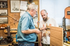 My dad showing me how to attach the drawer sides to the self clo