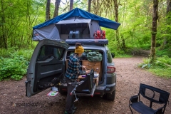 CrtrGrl making dinner at our campsite in a small campground in t